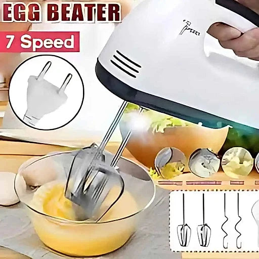 Handheld electric egg beater with 7 speed settings being used to mix eggs in a bowl.