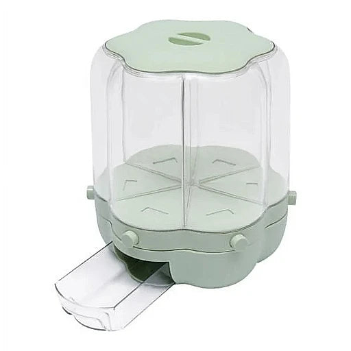 Green and transparent plastic container with a lid on a white background