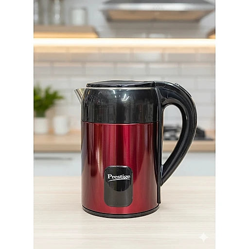 Red electric kettle with black handle on a kitchen counter