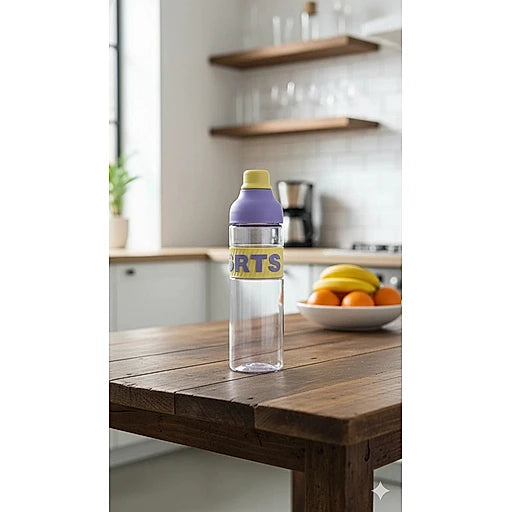 Clear water bottle with purple cap on a wooden table in a kitchen.