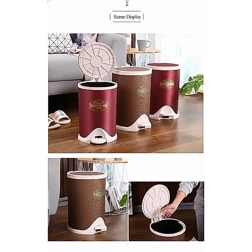 Set of three red and brown trash bins with lids on a wooden floor.