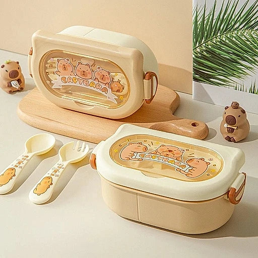 Children's lunch box set with cartoon design on a light background
